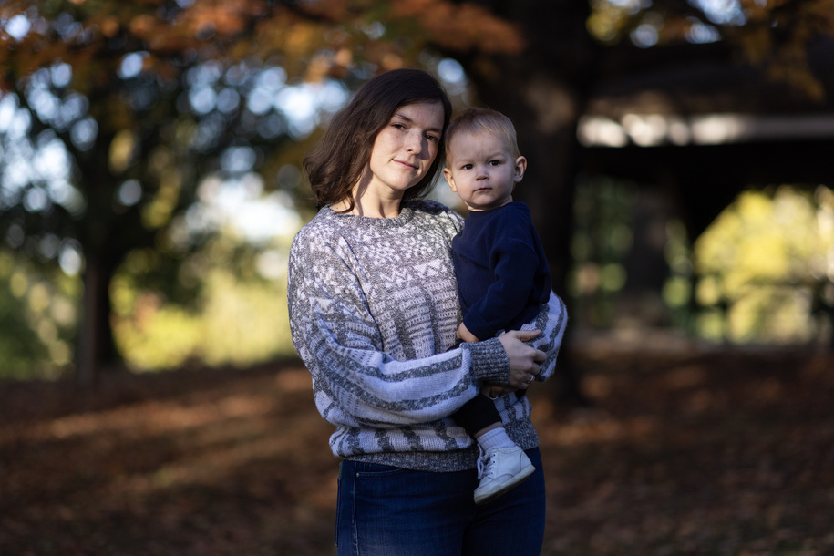 Elisabeth Yoder and her son Darragh recently experienced a huge gap in their health care "coverage." They stand in  front of the family home, and they belong to a Christian "health sharing" plan that didn't reimburse for a recent ambulance ride.